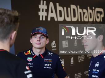 Max Verstappen of Red Bull Racing and Franco Colapinto of Williams ahead of the Formula 1 Abu Dhabi Grand Prix at Yas Marina Circuit in Abu...