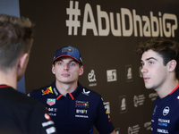 Max Verstappen of Red Bull Racing and Franco Colapinto of Williams ahead of the Formula 1 Abu Dhabi Grand Prix at Yas Marina Circuit in Abu...