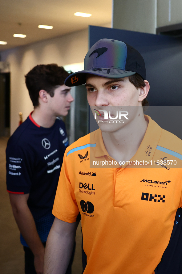 Franco Colapinto of Williams and Oscar Piastri of McLaren ahead of the Formula 1 Abu Dhabi Grand Prix at Yas Marina Circuit in Abu Dhabi, Un...