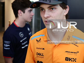 Franco Colapinto of Williams and Oscar Piastri of McLaren ahead of the Formula 1 Abu Dhabi Grand Prix at Yas Marina Circuit in Abu Dhabi, Un...