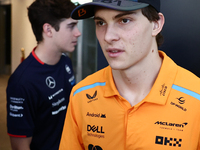 Franco Colapinto of Williams and Oscar Piastri of McLaren ahead of the Formula 1 Abu Dhabi Grand Prix at Yas Marina Circuit in Abu Dhabi, Un...