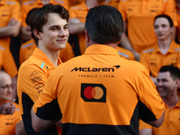 Oscar Piastri of McLaren and Zak Brown ahead of the Formula 1 Abu Dhabi Grand Prix at Yas Marina Circuit in Abu Dhabi, United Arab Emirates...