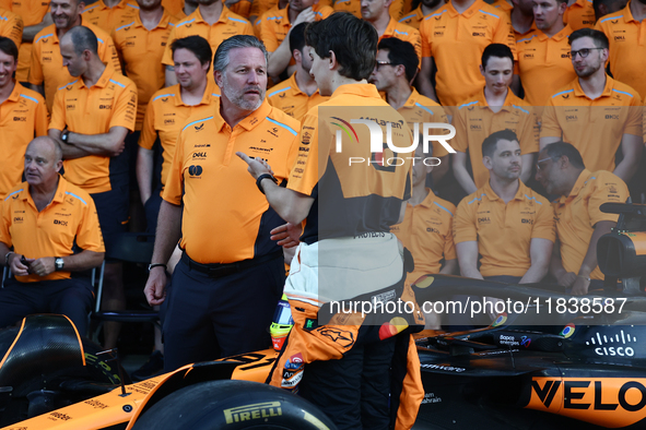 Zak Brown and Oscar Piastri of McLaren ahead of the Formula 1 Abu Dhabi Grand Prix at Yas Marina Circuit in Abu Dhabi, United Arab Emirates...