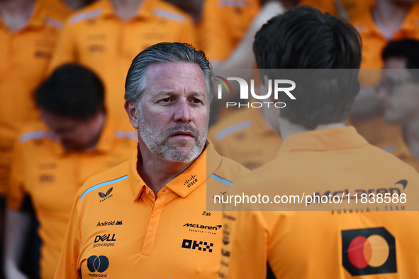 Zak Brown and Oscar Piastri of McLaren ahead of the Formula 1 Abu Dhabi Grand Prix at Yas Marina Circuit in Abu Dhabi, United Arab Emirates...