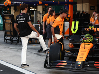 George Russell of Mercedes and Lando Norris of McLaren ahead of the Formula 1 Abu Dhabi Grand Prix at Yas Marina Circuit in Abu Dhabi, Unite...