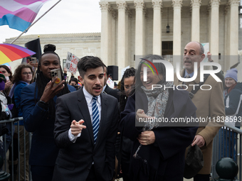 Demonstrations outside the Supreme Court as it hears a case on gender-affirming care for transgender children in Washington, DC, on December...