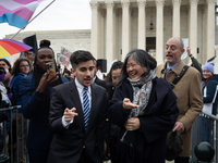 Demonstrations outside the Supreme Court as it hears a case on gender-affirming care for transgender children in Washington, DC, on December...