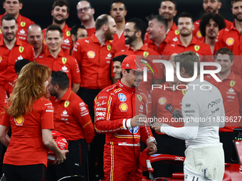 Charles Leclerc of Ferrari and Brad Pitt ahead of the Formula 1 Abu Dhabi Grand Prix at Yas Marina Circuit in Abu Dhabi, United Arab Emirate...