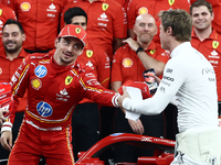 Charles Leclerc of Ferrari and Brad Pitt ahead of the Formula 1 Abu Dhabi Grand Prix at Yas Marina Circuit in Abu Dhabi, United Arab Emirate...