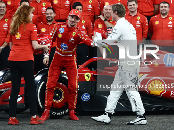 Charles Leclerc of Ferrari and Brad Pitt ahead of the Formula 1 Abu Dhabi Grand Prix at Yas Marina Circuit in Abu Dhabi, United Arab Emirate...