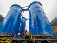 Workers carry out routine inspections on the facilities and equipment of the Ferriichong phosphate mine in Hualuo Village, Sanjia Street, Zh...