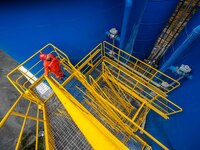 Workers carry out routine inspections on the facilities and equipment of the Ferriichong phosphate mine in Hualuo Village, Sanjia Street, Zh...