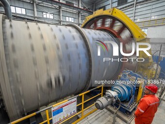 Workers carry out routine inspections on the facilities and equipment of the Ferriichong phosphate mine in Hualuo Village, Sanjia Street, Zh...