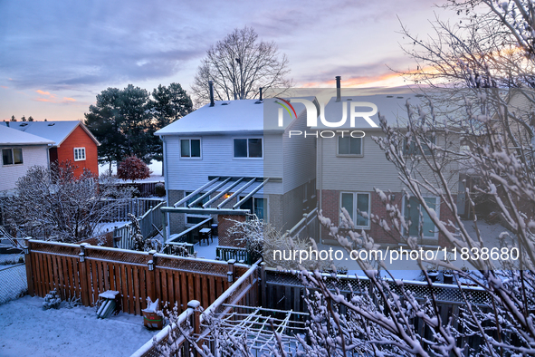 Snow covers houses following the first snowfall of the season in Toronto, Ontario, Canada, on December 5, 2024. 