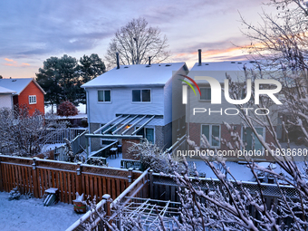 Snow covers houses following the first snowfall of the season in Toronto, Ontario, Canada, on December 5, 2024. (