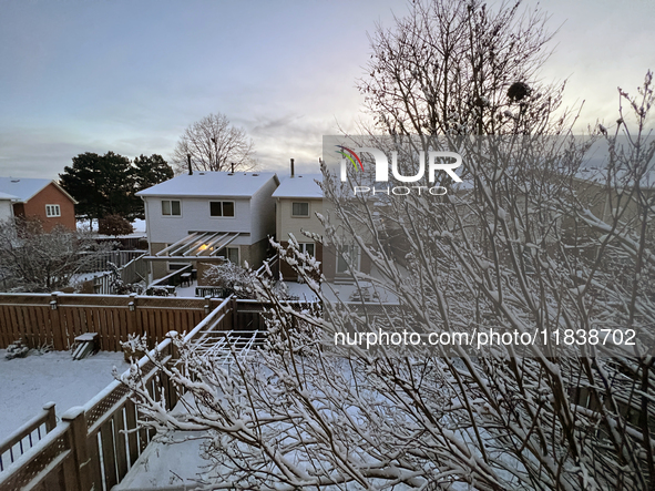 Snow covers houses following the first snowfall of the season in Toronto, Ontario, Canada, on December 5, 2024. 