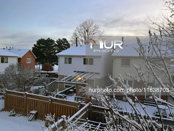 Snow covers houses following the first snowfall of the season in Toronto, Ontario, Canada, on December 5, 2024. 