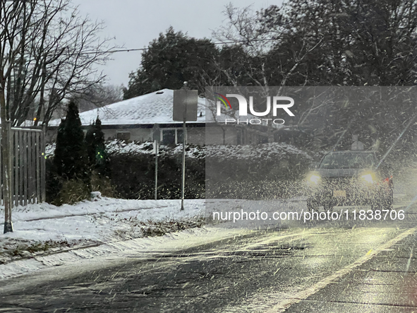 Snow falls in Toronto, Ontario, Canada, on December 5, 2024. 