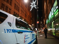 One teenage boy dies and one man is wounded in a stabbing in the Financial District section of Manhattan, New York, United States, on Decemb...