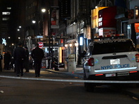 One teenage boy dies and one man is wounded in a stabbing in the Financial District section of Manhattan, New York, United States, on Decemb...