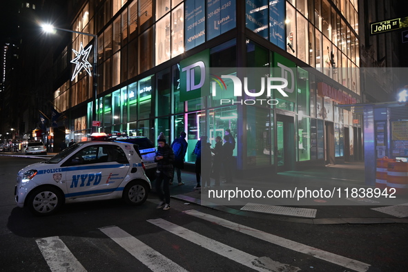 One teenage boy dies and one man is wounded in a stabbing in the Financial District section of Manhattan, New York, United States, on Decemb...