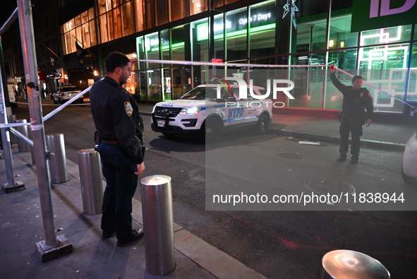 One teenage boy dies and one man is wounded in a stabbing in the Financial District section of Manhattan, New York, United States, on Decemb...