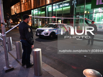 One teenage boy dies and one man is wounded in a stabbing in the Financial District section of Manhattan, New York, United States, on Decemb...