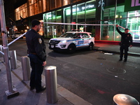 One teenage boy dies and one man is wounded in a stabbing in the Financial District section of Manhattan, New York, United States, on Decemb...