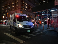 The NYPD Crime Scene Unit investigates the scene where one teenage boy is killed and one man is wounded in a stabbing in the Financial Distr...