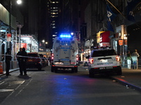 The NYPD Crime Scene Unit investigates the scene where one teenage boy is killed and one man is wounded in a stabbing in the Financial Distr...