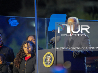 President Biden switches on the National Christmas Tree in subfreezing weather in Washington, D.C., United States, on December 5, 2024. Sing...