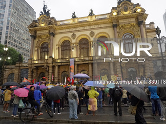 Demonstrators shout slogans as they participate in a protest against Sao Paulo's governor, Tarcisio de Freitas, and the violence of the poli...