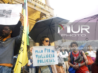 Demonstrators shout slogans as they participate in a protest against Sao Paulo's governor, Tarcisio de Freitas, and the violence of the poli...