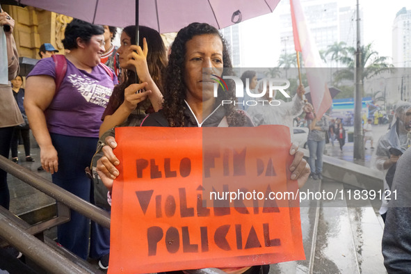 Demonstrators shout slogans as they participate in a protest against Sao Paulo's governor, Tarcisio de Freitas, and the violence of the poli...