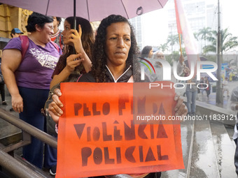 Demonstrators shout slogans as they participate in a protest against Sao Paulo's governor, Tarcisio de Freitas, and the violence of the poli...