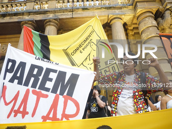 Demonstrators shout slogans as they participate in a protest against Sao Paulo's governor, Tarcisio de Freitas, and the violence of the poli...