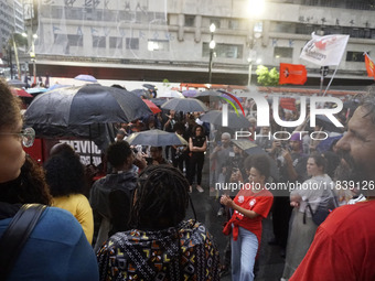 Demonstrators shout slogans as they participate in a protest against Sao Paulo's governor, Tarcisio de Freitas, and the violence of the poli...