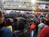 Demonstrators shout slogans as they participate in a protest against Sao Paulo's governor, Tarcisio de Freitas, and the violence of the poli...