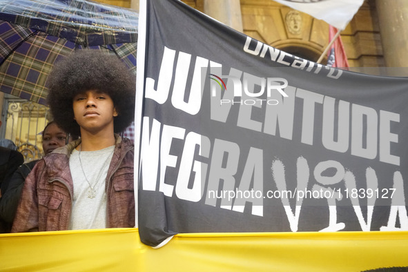 Demonstrators shout slogans as they participate in a protest against Sao Paulo's governor, Tarcisio de Freitas, and the violence of the poli...