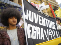 Demonstrators shout slogans as they participate in a protest against Sao Paulo's governor, Tarcisio de Freitas, and the violence of the poli...