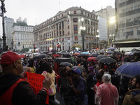 Demonstrators shout slogans as they participate in a protest against Sao Paulo's governor, Tarcisio de Freitas, and the violence of the poli...