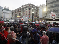 Demonstrators shout slogans as they participate in a protest against Sao Paulo's governor, Tarcisio de Freitas, and the violence of the poli...