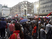 Demonstrators shout slogans as they participate in a protest against Sao Paulo's governor, Tarcisio de Freitas, and the violence of the poli...