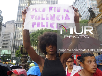 Demonstrators shout slogans as they participate in a protest against Sao Paulo's governor, Tarcisio de Freitas, and the violence of the poli...