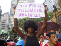 Demonstrators shout slogans as they participate in a protest against Sao Paulo's governor, Tarcisio de Freitas, and the violence of the poli...