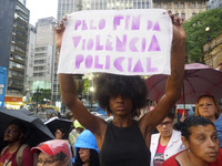 Demonstrators shout slogans as they participate in a protest against Sao Paulo's governor, Tarcisio de Freitas, and the violence of the poli...