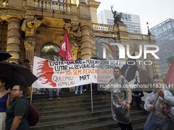 Demonstrators shout slogans as they participate in a protest against Sao Paulo's governor, Tarcisio de Freitas, and the violence of the poli...