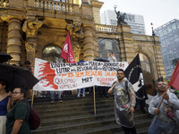 Demonstrators shout slogans as they participate in a protest against Sao Paulo's governor, Tarcisio de Freitas, and the violence of the poli...