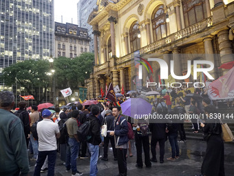 Demonstrators shout slogans as they participate in a protest against Sao Paulo's governor, Tarcisio de Freitas, and the violence of the poli...