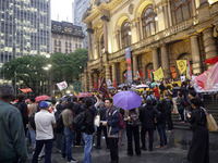 Demonstrators shout slogans as they participate in a protest against Sao Paulo's governor, Tarcisio de Freitas, and the violence of the poli...